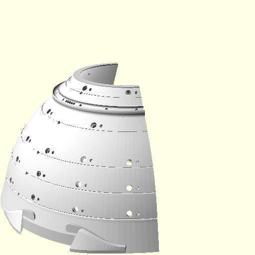 The dome's exterior with the near half cut away, showing cathode-groove rings, LED sockets, trumpet taps, and the dovetail jaws at the foot.