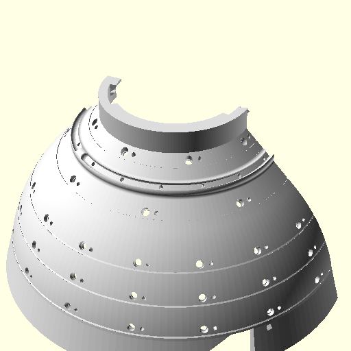 The dome cut in half, showing the interior light bands, the socket bores aimed inward, the flared foot, and the fence wall at the blade opening.